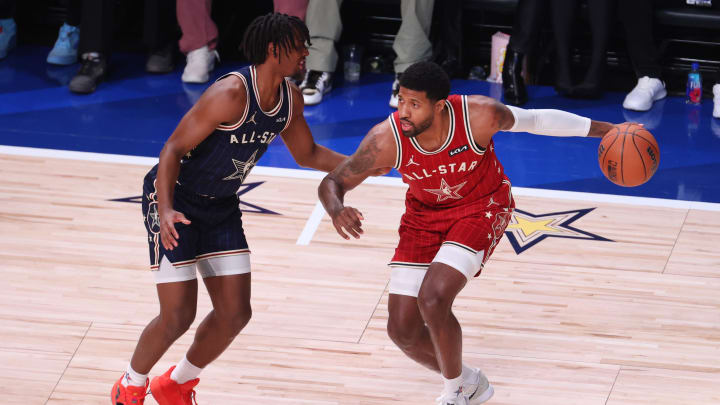 Feb 18, 2024; Indianapolis, Indiana, USA; Western Conference forward Paul George (13) of the LA Clippers dribbles the ball against Eastern Conference guard Tyrese Maxey (0) of the Philadelphia 76ers during the second quarter in the 73rd NBA All Star game at Gainbridge Fieldhouse. Mandatory Credit: Trevor Ruszkowski-USA TODAY Sports