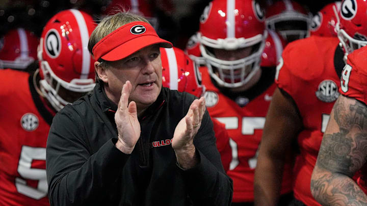 Georgia coach Kirby Smart takes the field with his team before the start of the SEC championship game against Texas in Atlanta, on Saturday, Dec. 7, 2024. Georgia coach Kirby Smart takes the field with his team before the start of the SEC championship game against Texas in Atlanta, on Saturday, Dec. 7, 2024.