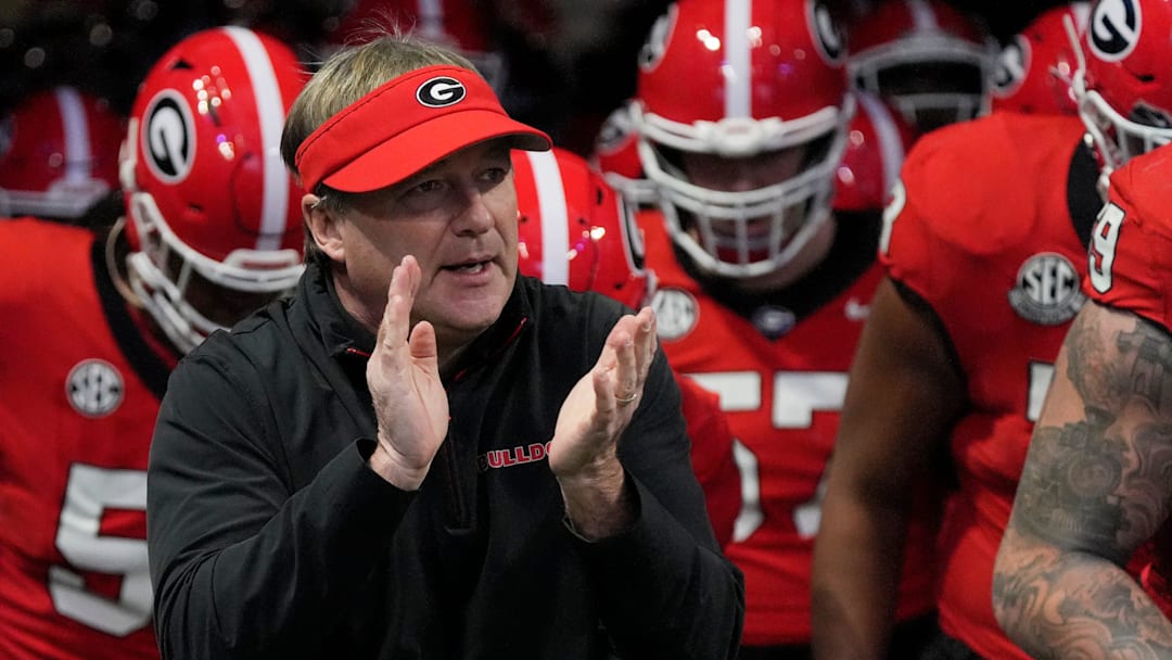 Georgia coach Kirby Smart takes the field with his team before the start of the SEC championship game against Texas in Atlanta, on Saturday, Dec. 7, 2024.