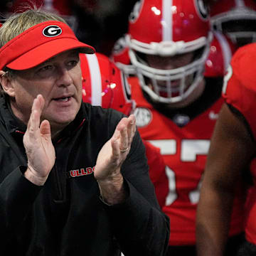 Georgia coach Kirby Smart takes the field with his team before the start of the SEC championship game against Texas in Atlanta, on Saturday, Dec. 7, 2024.
