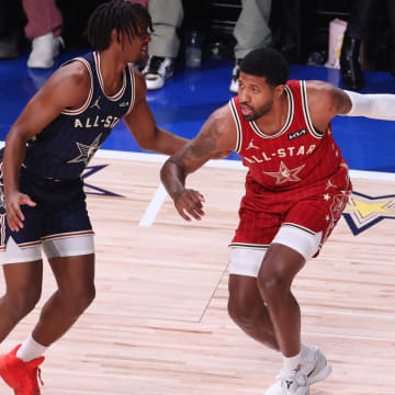 Feb 18, 2024; Indianapolis, Indiana, USA; Western Conference forward Paul George (13) of the LA Clippers dribbles the ball against Eastern Conference guard Tyrese Maxey (0) of the Philadelphia 76ers during the second quarter in the 73rd NBA All Star game at Gainbridge Fieldhouse. Mandatory Credit: Trevor Ruszkowski-USA TODAY Sports