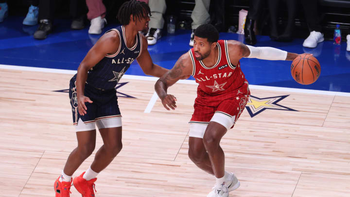 Feb 18, 2024; Indianapolis, Indiana, USA; Western Conference forward Paul George (13) of the LA Clippers dribbles the ball against Eastern Conference guard Tyrese Maxey (0) of the Philadelphia 76ers during the second quarter in the 73rd NBA All Star game at Gainbridge Fieldhouse. Mandatory Credit: Trevor Ruszkowski-USA TODAY Sports