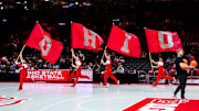 Ohio State Buckeyes cheerleaders run on to the court with flags before the game against the Kent State Golden Flashes at Value City Arena on Wednesday, Nov. 19, 2025 in Columbus, Ohio.