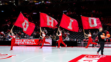 Ohio State Buckeyes cheerleaders run on to the court with flags before the game against the Kent State Golden Flashes at Value City Arena on Wednesday, Nov. 19, 2025 in Columbus, Ohio.