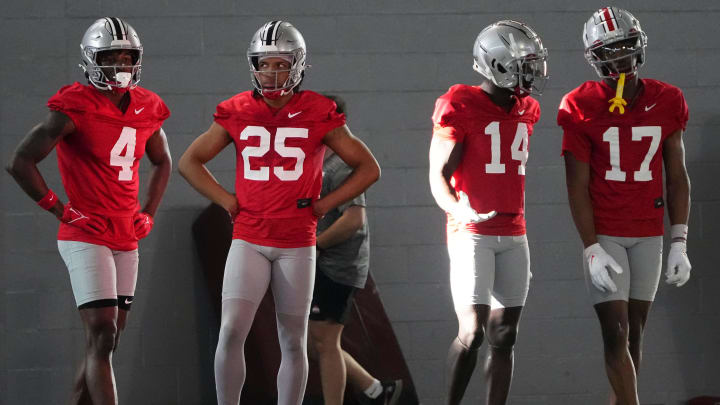 Mar 5, 2024; Columbus, OH, USA; Ohio State Buckeyes wide receivers Jeremiah Smith (4), Kai Saunders (25), Kojo Antwi (14) and Carnell Tate (17) line up during the first spring practice at the Woody Hayes Athletic Center.