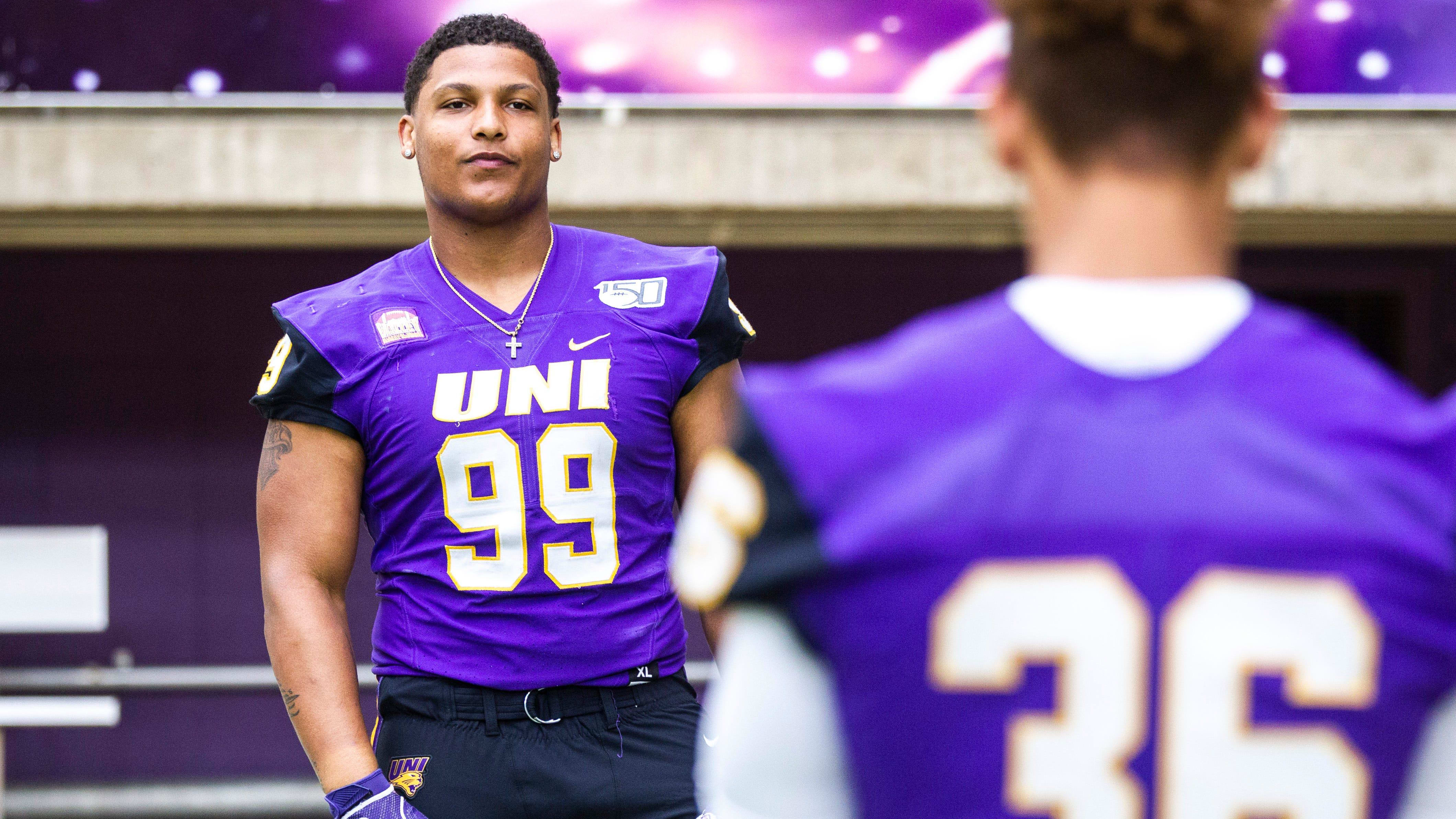 Khristian Boyd (99) poses for a photo during the Panthers football media day