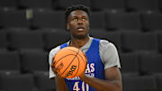 Mar 19, 2025; Providence, RI, USA; Kansas Jayhawks forward Flory Bidunga (40)  practices at Amica Mutual Pavilion. Mandatory Credit: Eric Canha-Imagn Images