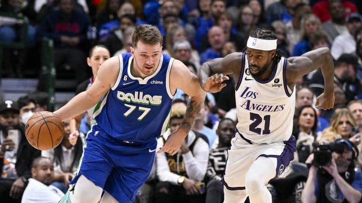 Dec 25, 2022; Dallas, Texas, USA; Dallas Mavericks guard Luka Doncic (77) and Los Angeles Lakers guard Patrick Beverley (21) in action during the game between the Dallas Mavericks and the Los Angeles Lakers at American Airlines Center. Mandatory Credit: Jerome Miron-USA TODAY Sports