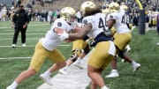 Notre Dame defensive linemen Joshua Burnham (40) and Junior Tuihalamaka (44) Saturday, April 20, 2024, at the annual Notre Dame Blue-Gold spring football game at Notre Dame Stadium in South Bend.