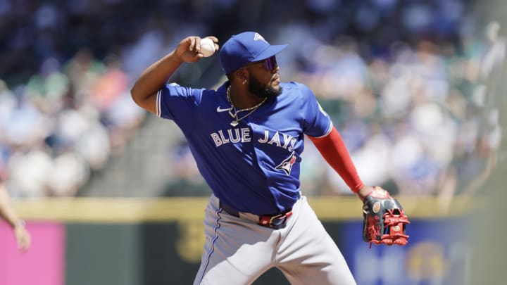 Toronto Blue Jays third baseman Vladimir Guerrero Jr. (27) throws out Seattle Mariners first baseman Ty France (23) during the fourth inning at T-Mobile Park on July 7.