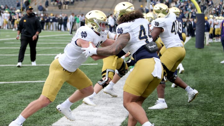 Notre Dame defensive linemen Joshua Burnham (40) and Junior Tuihalamaka (44) Saturday, April 20, 2024, at the annual Notre Dame Blue-Gold spring football game at Notre Dame Stadium in South Bend.