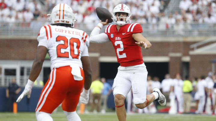 Sep 2, 2023; Oxford, Mississippi, USA; Mississippi Rebels quarterback Jaxson Dart (2) fakes a pass during the first half against the Mercer Bears at Vaught-Hemingway Stadium. Mandatory Credit: Petre Thomas-USA TODAY Sports