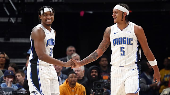 Orlando Magic center Wendell Carter Jr. (34) reacts with forward Paolo Banchero (5) after a block by Banchero during the first half against the Memphis Grizzlies at FedExForum. 