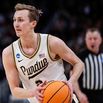 Purdue guard Fletcher Loyer (2) looks to pass against Tennessee 