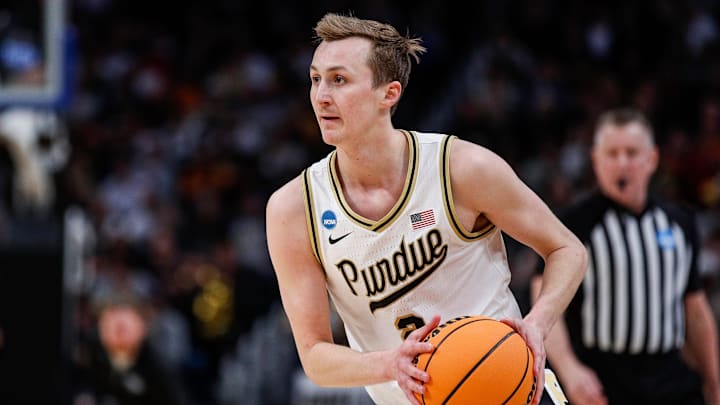 Purdue guard Fletcher Loyer (2) looks to pass against Tennessee 