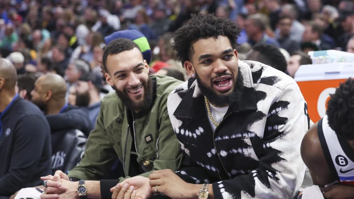 Feb 8, 2023; Salt Lake City, Utah, USA; Minnesota Timberwolves center Rudy Gobert (left) and center Karl-Anthony Towns (right) react to a play by the Utah Jazz in the fourth quarter at Vivint Arena. Mandatory Credit: Rob Gray-USA TODAY Sports