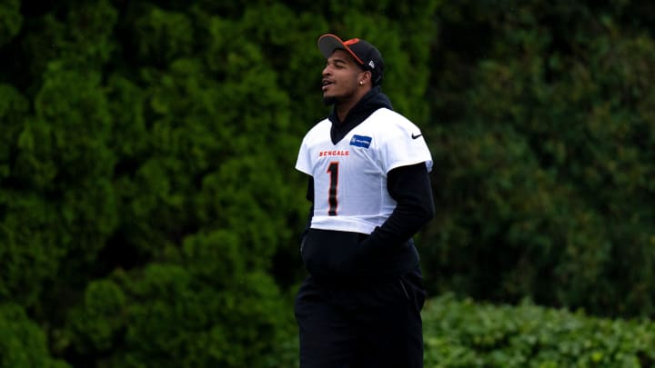 Cincinnati Bengals wide receiver Ja'Marr Chase (1) walks onto the field at Cincinnati Bengals training camp on the Kettering Health Practice Fields in Cincinnati on Sunday, July 28, 2024.