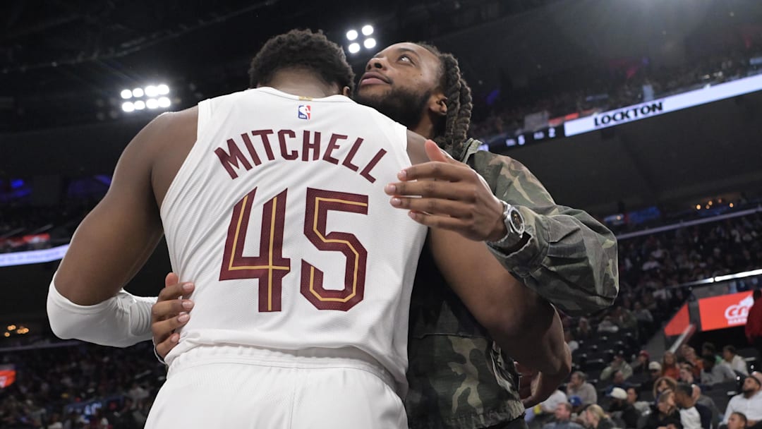 Feb 4, 2026; Inglewood, California, USA; Los Angeles Clippers Darius Garland gets a hug from Cleveland Cavaliers guard Donovan Mitchell (45) during the second half at Intuit Dome. Mandatory Credit: Jayne Kamin-Oncea-Imagn Images