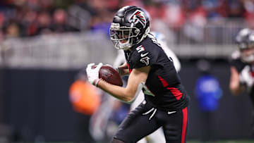 Jan 5, 2025; Atlanta, Georgia, USA; Atlanta Falcons wide receiver Drake London (5) runs after a catch against the Carolina Panthers in the second quarter at Mercedes-Benz Stadium. Mandatory Credit: Brett Davis-Imagn Images
