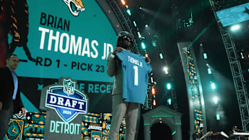Apr 25, 2024; Detroit, MI, USA; LSU Tigers wide receiver Brian Thomas Jr. poses after being selected by the Jacksonville Jaguars as the No. 23 pick during the first round of the 2024 NFL Draft at Campus Martius Park and Hart Plaza. Mandatory Credit: Kirby Lee-Imagn Images