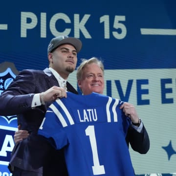 Apr 25, 2024; Detroit, MI, USA; UCLA Bruins defensive lineman Laiatu Latu poses with NFL