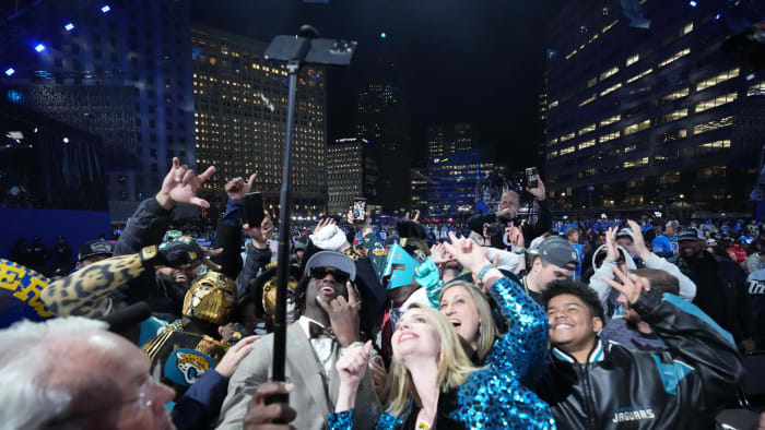 Apr 25, 2024; Detroit, MI, USA; LSU Tigers wide receiver Brian Thomas Jr. poses with fans after