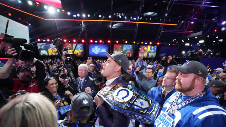 Apr 25, 2024; Detroit, MI, USA; UCLA Bruins defensive lineman Laiatu Latu poses with fans after being selected by the Indianapolis Colts as the No. 15 pick in the first round of the 2024 NFL Draft at Campus Martius Park and Hart Plaza. Mandatory Credit: Kirby Lee-USA TODAY Sports