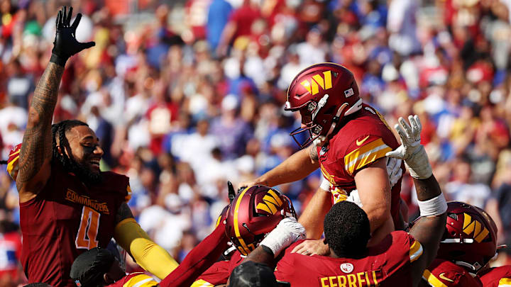 Sep 15, 2024; Landover, Maryland, USA; Washington Commanders place kicker Austin Seibert (3) celebrates with his teammates after making the game winning field goal against the New York Giants at Commanders Field. Mandatory Credit: Peter Casey-Imagn Images