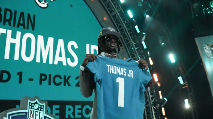 Apr 25, 2024; Detroit, MI, USA; LSU Tigers wide receiver Brian Thomas Jr. poses after being selected by the Jacksonville Jaguars as the No. 23 pick during the first round of the 2024 NFL Draft at Campus Martius Park and Hart Plaza. Mandatory Credit: Kirby Lee-USA TODAY Sports