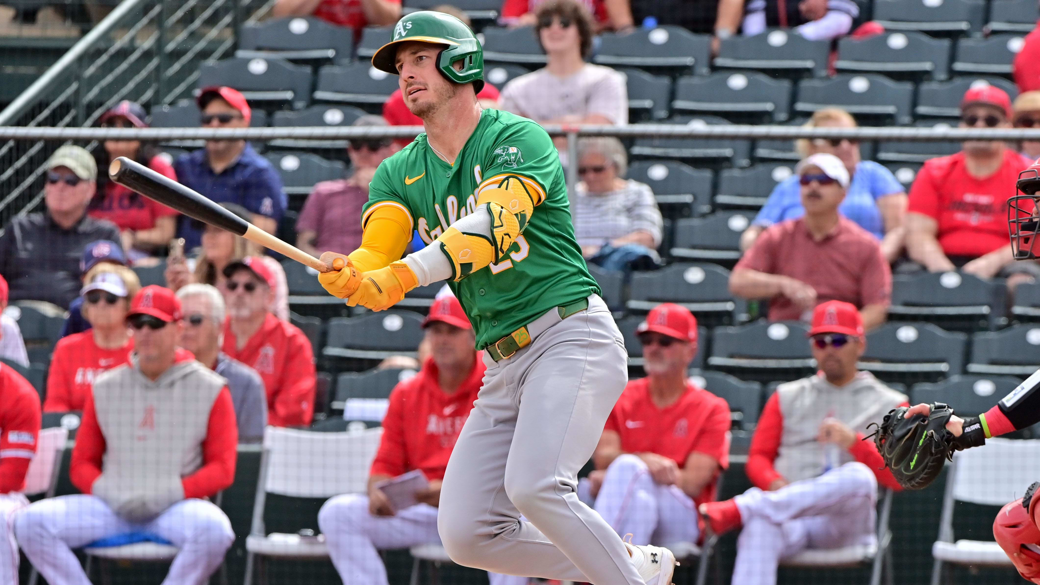 Mar 6, 2024; Tempe, Arizona, USA;  Oakland Athletics left fielder Brent Rooker (25) singles in a Spring Training game.