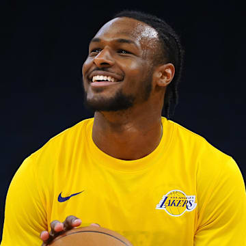 Jul 10, 2024; San Francisco, CA, USA; Los Angeles Lakers guard Bronny James Jr. (9) smiles during warm ups before a game against the Miami Heat at Chase Center. Mandatory Credit: Kelley L Cox-Imagn Images