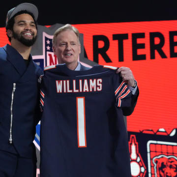 Caleb Williams is announced as the first pick of the draft by NFL commissioner Roger Goodell in Detroit. 
