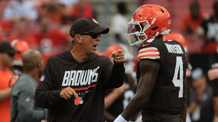 Cleveland Browns head coach Todd Monken, left, speaks with quarterback Deshaun Watson