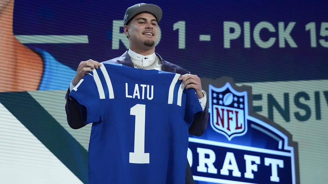 Apr 25, 2024; Detroit, MI, USA; UCLA Bruins defensive lineman Laiatu Latu poses after being selected by the Indianapolis Colts as the No. 15 pick in the first round of the 2024 NFL Draft at Campus Martius Park and Hart Plaza. Mandatory Credit: Kirby Lee-Imagn Images