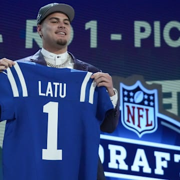 Apr 25, 2024; Detroit, MI, USA; UCLA Bruins defensive lineman Laiatu Latu poses after being selected by the Indianapolis Colts as the No. 15 pick in the first round of the 2024 NFL Draft at Campus Martius Park and Hart Plaza. Mandatory Credit: Kirby Lee-Imagn Images