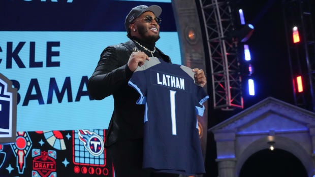 Apr 25, 2024; Detroit, MI, USA; Alabama Crimson Tide offensive lineman JC Latham poses after being selected by the Tennessee Titans as the No. 7 pick in the first round of the 2024 NFL Draft at Campus Martius Park and Hart Plaza. Mandatory Credit: Kirby Lee-USA TODAY Sports