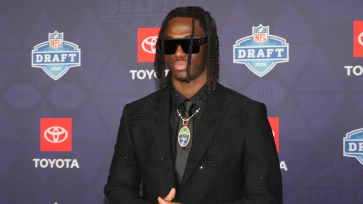 Apr 25, 2024; Detroit, MI, USA; Ohio State Buckeyes wide receiver Marvin Harrison Jr. stands on the red carpet ahead of the 2024 NFL Draft at Detroit’s Fox Theatre. Mandatory Credit: Kirby Lee-USA TODAY Sports