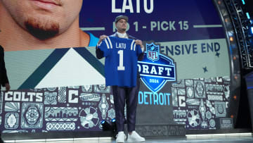 Apr 25, 2024; Detroit, MI, USA; UCLA Bruins defensive lineman Laiatu Latu poses after being selected