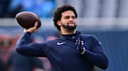 Dec 22, 2024; Chicago, Illinois, USA; Chicago Bears quarterback Caleb Williams (18) warms up before a game against the Detroit Lions at Soldier Field. Mandatory Credit: Daniel Bartel-Imagn Images