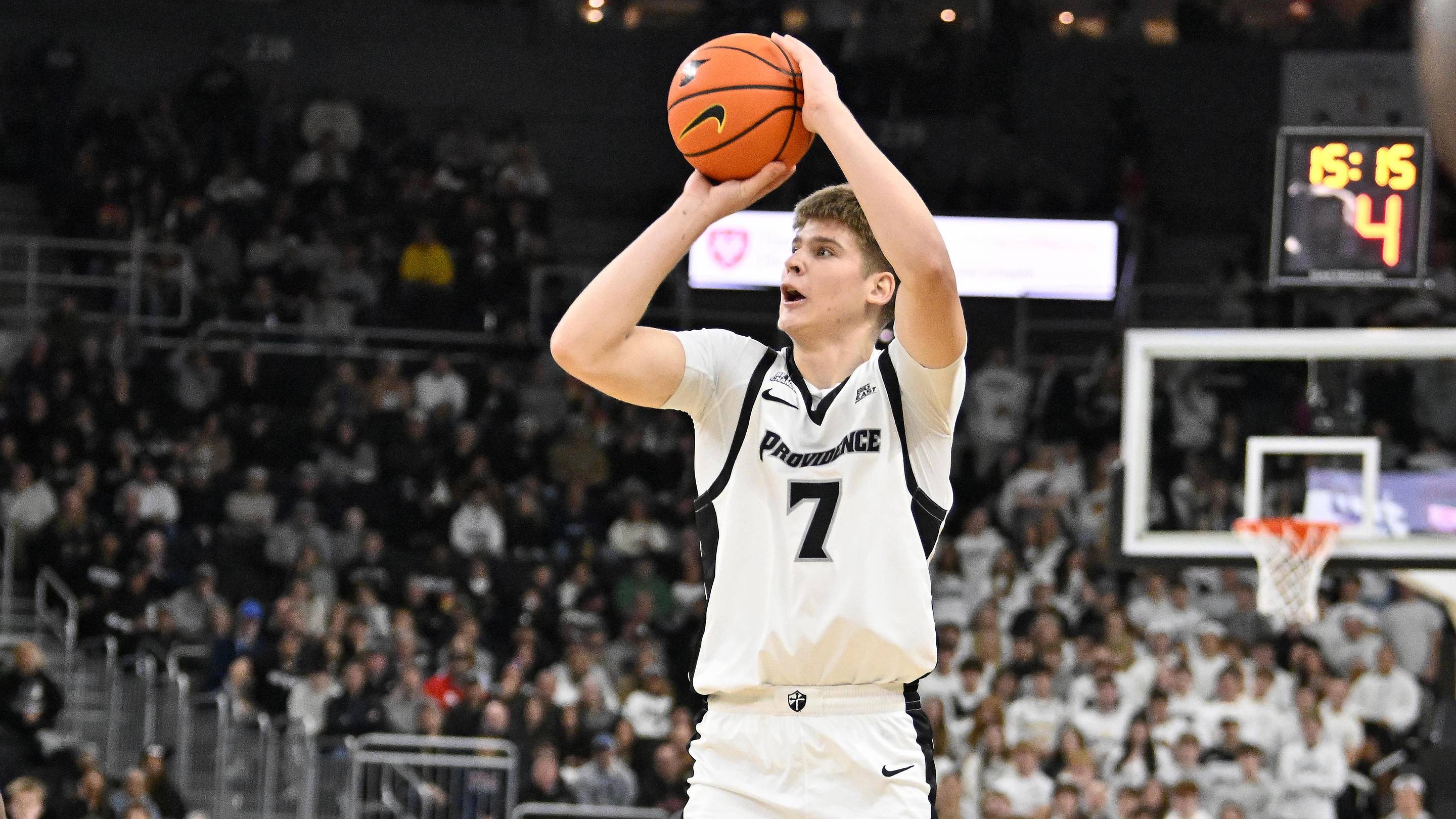 Dec 6, 2025; Providence, Rhode Island, USA; Providence Friars guard Stefan Vaaks (7) shoots the ball over Rhode Island Rams forward Tyler Cochran (23) for three points during the first half at Amica Mutual Pavilion. Mandatory Credit: Eric Canha-Imagn Images