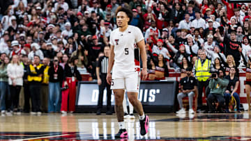 Darrion Williams #5 of the Texas Tech Red Raiders stands on the court as fans gesture during overtime of the game against the Arizona State Sun Devils at United Supermarkets Arena on February 12, 2025 in Lubbock, Texas.