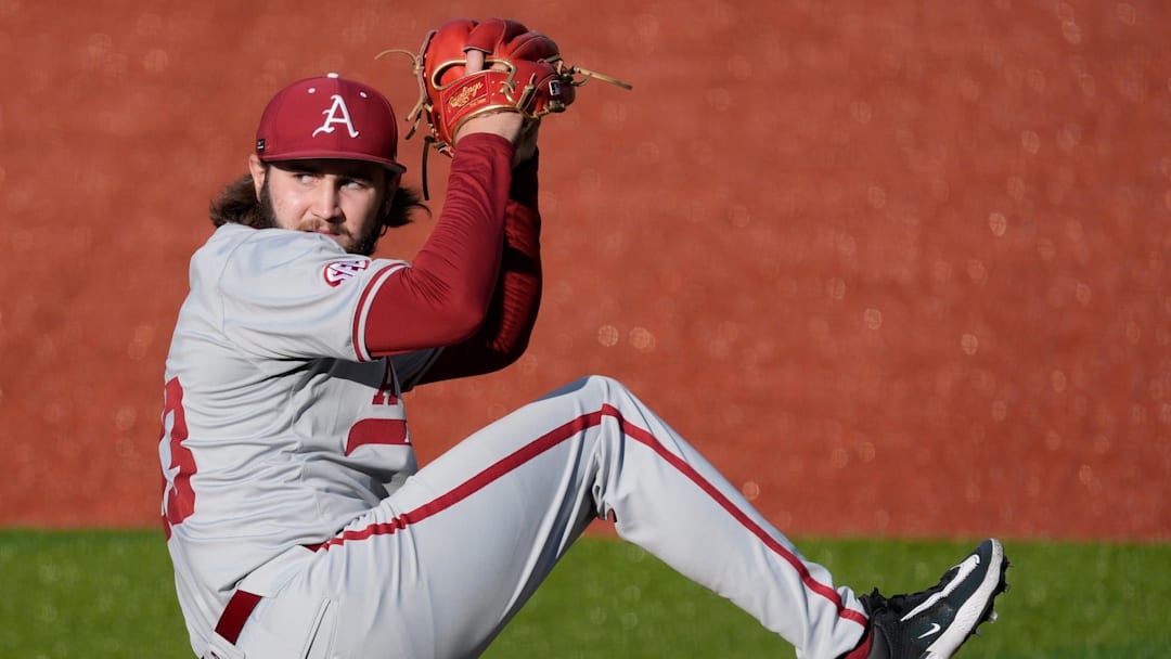Arkansas pitcher Zach Root (33) looks to throw a pitch during a NCAA baseball game against Georgia in Athens, Ga., on Friday, April 11, 2025.