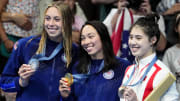 Jul 28, 2024; Nanterre, France; Gretchen Walsh (USA), Torri Huske (USA) and Yufei Zhang (China) in the women’s 100-meter butterfly medal ceremony during the Paris 2024 Olympic Summer Games at Paris La Défense Arena. Mandatory Credit: Rob Schumacher-USA TODAY Sports