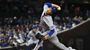 Sep 24, 2025; Chicago, Illinois, USA;  New York Mets pitcher Jonah Tong (21) throws pitch during the first inning against the Chicago Cubs at Wrigley Field. Mandatory Credit: Matt Marton-Imagn Images