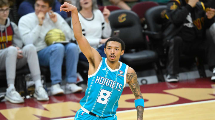 Apr 14, 2024; Cleveland, Ohio, USA; Charlotte Hornets guard Nick Smith Jr. (8) reacts after making a three-point basket in the fourth quarter against the Cleveland Cavaliers at Rocket Mortgage FieldHouse. Mandatory Credit: David Richard-USA TODAY Sports