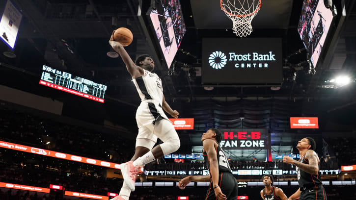 Apr 14, 2024; San Antonio, Texas, USA; San Antonio Spurs guard Sidy Cissoko (25) goes up to dunk
