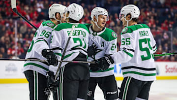 Mar 27, 2025; Calgary, Alberta, CAN; Dallas Stars center Roope Hintz (24) celebrates his goal with teammates against the Calgary Flames during the first period at Scotiabank Saddledome. Mandatory Credit: Sergei Belski-Imagn Images