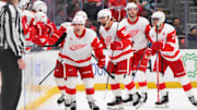 Feb 4, 2025; Seattle, Washington, USA; Detroit Red Wings right wing Jonatan Berggren (48) celebrates with the bench after scoring a goal against the Seattle Kraken during the second period at Climate Pledge Arena. Mandatory Credit: Steven Bisig-Imagn Images