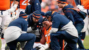 Oct 31, 2021; Denver, Colorado, USA; Denver Broncos offensive tackle Garett Bolles (72) is tended to