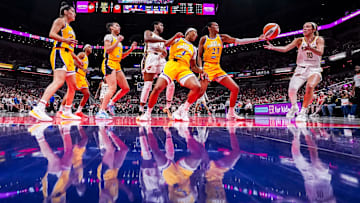 Indiana Fever guard Lexie Hull (10) grabs the ball Thursday, June 26, 2025, during a game between the Indiana Fever and the Los Angeles Sparks at Gainbridge Fieldhouse in Indianapolis. The Los Angeles Sparks defeated the Indiana Fever, 85-75.